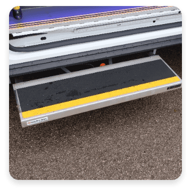 Electric side steps for minibus