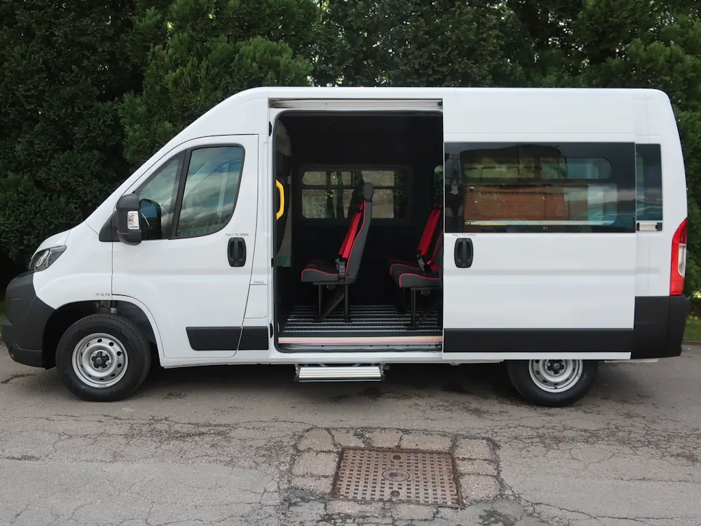 Peugeot-Boxer-Professional-15-Seat-Shuttle-Minibus-External-Nearside-Door-Open