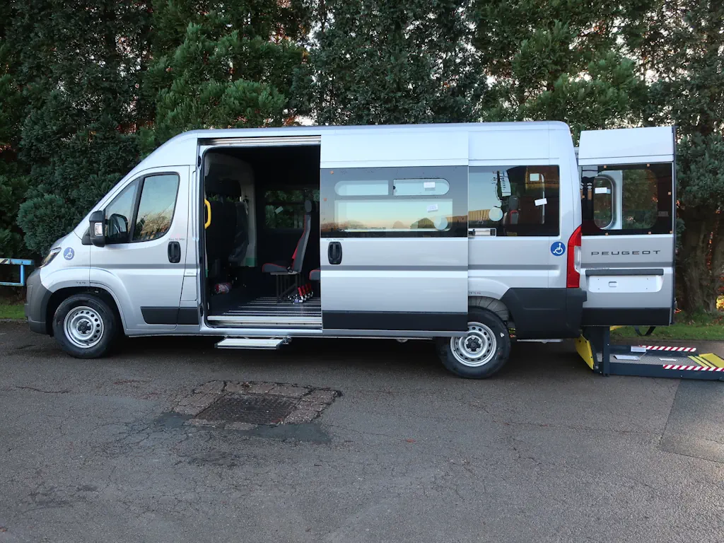 Peugeot-Boxer-Professional-L3-H2-14-Seat-EasyOn-Wheelchair-Accessible-Minibus-With-Onboard-Lift-For-Sale-External-Side-Left-Lift-Deployed